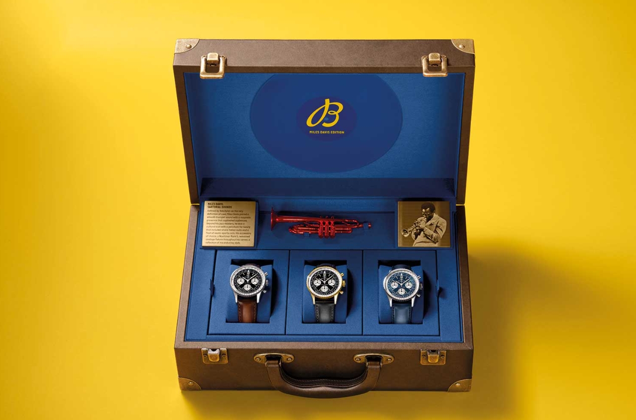 Multiple Navitimer style watches displayed in a presentation case